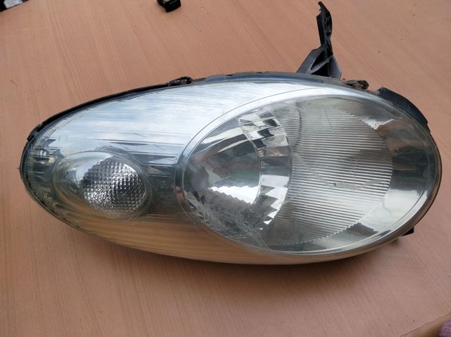 NISSAN 26060AX700 Faro izquierdo  disponible Lugo