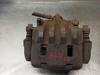 Pinza de freno, Eje delantero izquierda 26292SA011 SUBARU