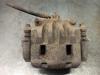 Pinza de freno, Eje delantero izquierda 26292SC030 SUBARU