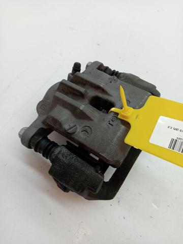 Pinza de freno trasera derecha 26692AG020 SUBARU