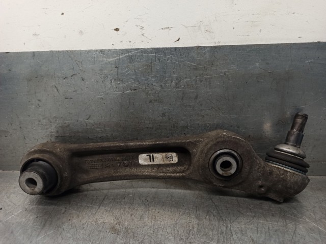 Brazo inferior izquierdo de la suspensión delantera 31122450813 BMW