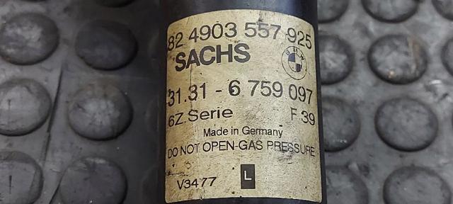 Amortiguador eje delantero izquierda 31316759097 BMW