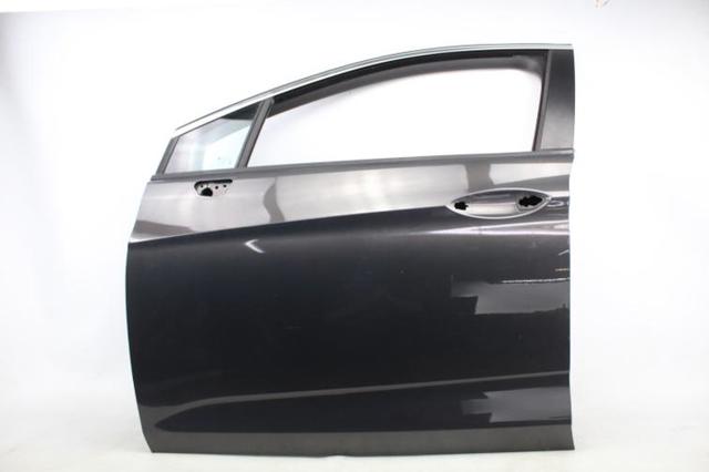 Puerta del conductor Opel Astra  familiar comprar en España