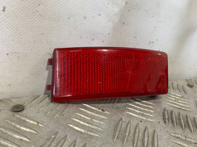 Reflector, paragolpes trasero, izquierdo 3M5113B415AB FORD