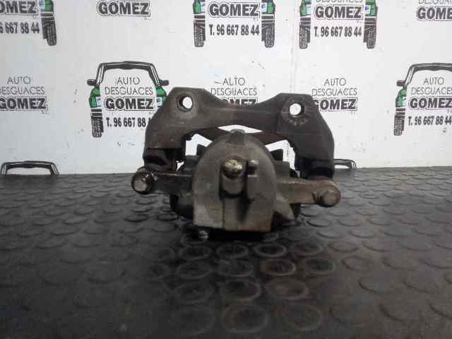 Pinza de freno, Eje delantero derecha 410012F52A NISSAN