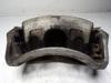 Pinza de freno, Eje delantero izquierda 410113DN0A NISSAN