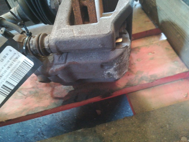 41011AX60A NISSAN Pinza de freno delantera izquierda  disponible Vigo