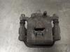 Pinza de freno trasero derecho 440011KD0A NISSAN