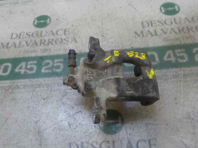 Pinza de freno trasera derecha 44001EM11A NISSAN