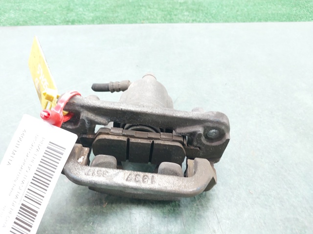 44001EM11A NISSAN Pinza de freno trasera derecha comprar Madrid