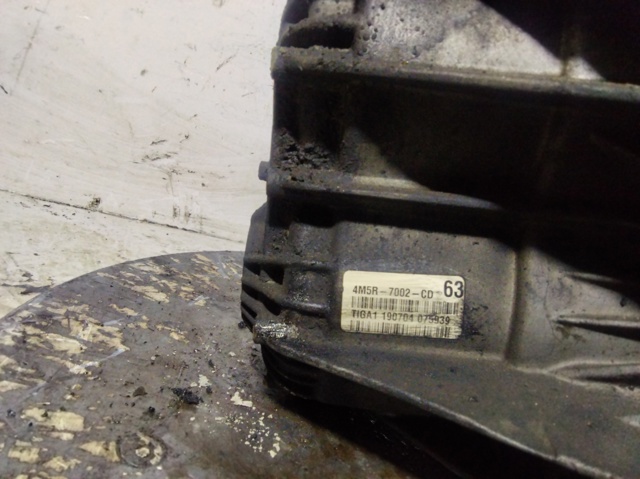 4M5R7002CD Ford