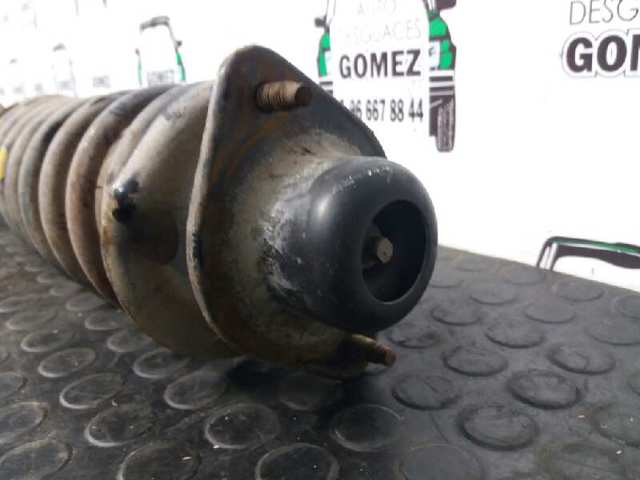 amortiguador frontal derecho 543025F625 NISSAN