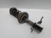 Amortiguador strut delantero 543026803R RENAULT