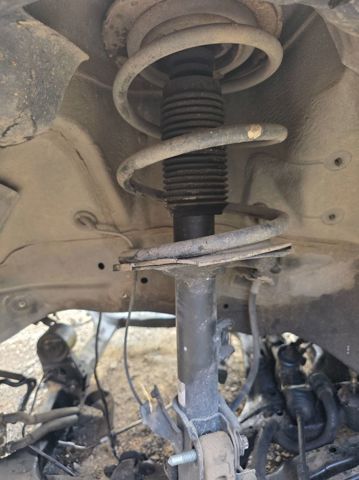 Amortiguador frontal izquierdo 54303CB025 NISSAN