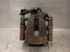 Pinza de freno trasero derecho 5542452 OPEL