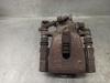 Pinza de freno trasero derecho 5542452 OPEL