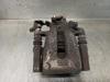Pinza de freno trasero derecho 5542452 OPEL