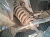 Amortiguador strut delantero 56100EB39D NISSAN