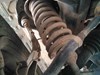 Amortiguador strut delantero 56100EB39D NISSAN