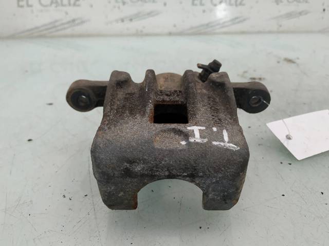 Pinza de freno trasera izquierda 582102E300 HYUNDAI