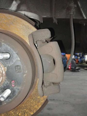 Pinza de freno trasera izquierda 583001W350 HYUNDAI