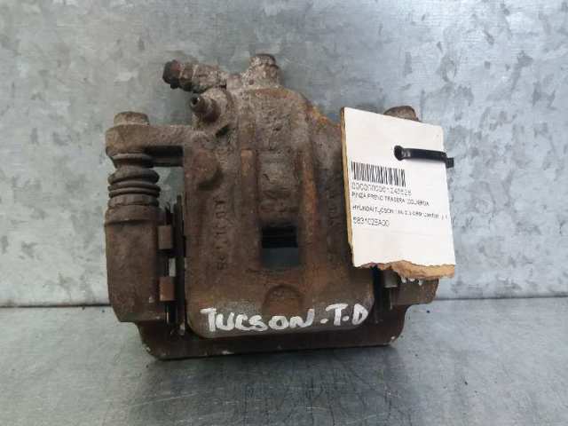 Pinza de freno trasera izquierda 583102EA00 HYUNDAI