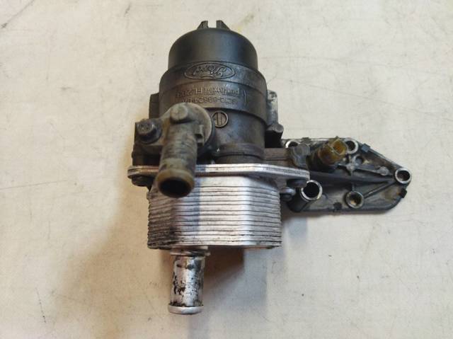 Portafiltro de aceite 6C1Q6B624BA FORD
