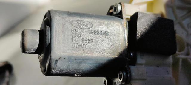 6M2114553B Motor del elevalunas de la puerta delantera derecha  disponible Málaga