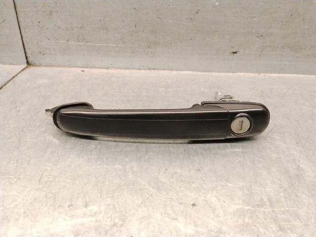 Manija exterior izquierda de puerta delantera 6N0837207A VAG