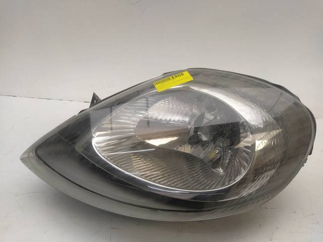 Faros 7700311371 NISSAN