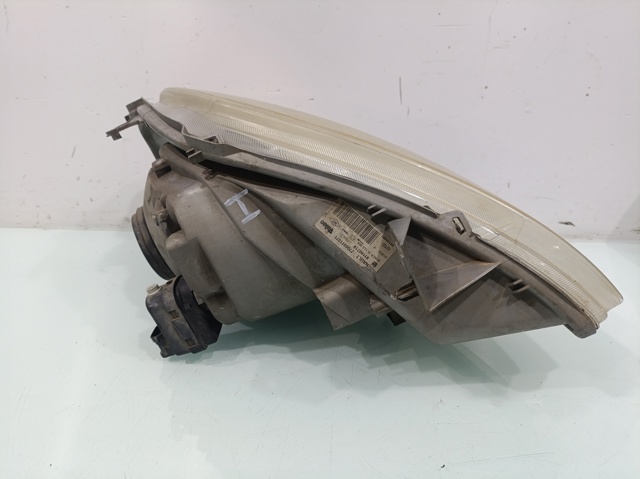 OPEL 7700311371 Faro izquierdo  en stock Terrassa