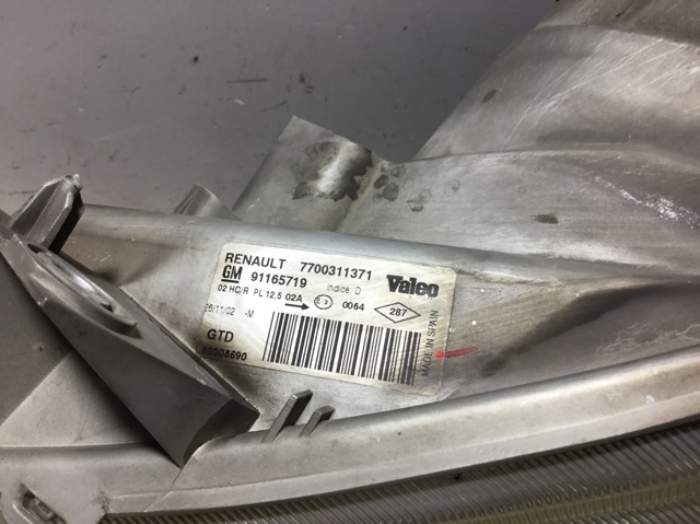 OPEL 7700311371 Faro izquierdo  disponible España