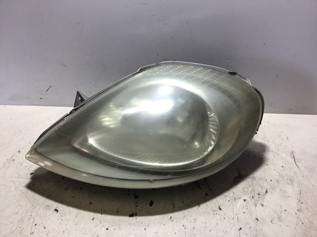 OPEL 7700311371 Faro izquierdo  en stock Terrassa