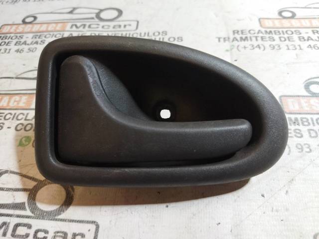 7700415974 Manija interior izquierda delantera/trasera de puerta  en stock Sabadell