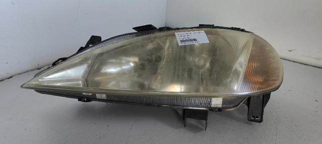 7700427874G RENAULT Faro izquierdo  en stock Huelva