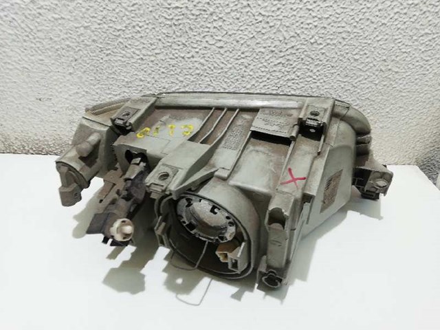 7700796425 RENAULT Faro izquierdo  en stock Huelva