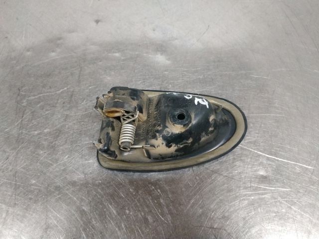 7700830078 Manija interior de puerta delantera izquierda  en stock Sabadell