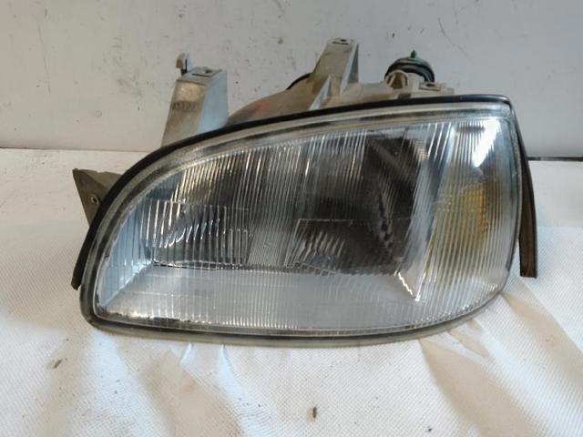 7701042150 RENAULT Faro izquierdo  en stock Gandía