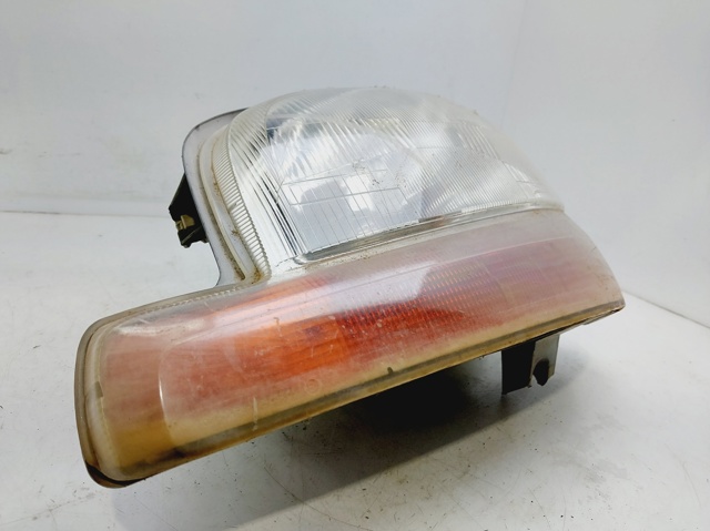 7701044037 RENAULT Faro izquierdo  en stock Gandía
