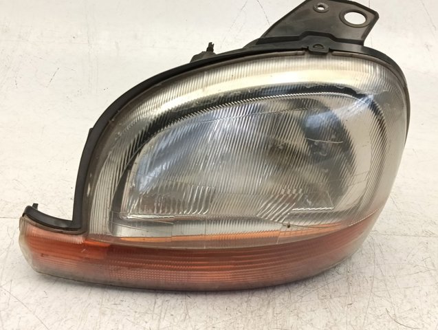 7701044037 Faro izquierdo  en stock Sabadell