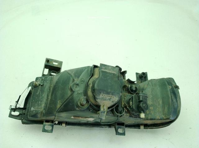 7701044518 RENAULT Faro izquierdo  en stock Huelva