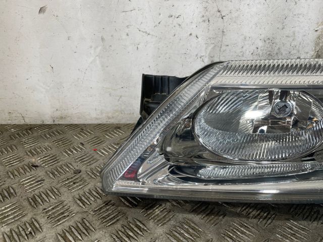 7701048927 RENAULT Faro izquierdo  en stock Gandía