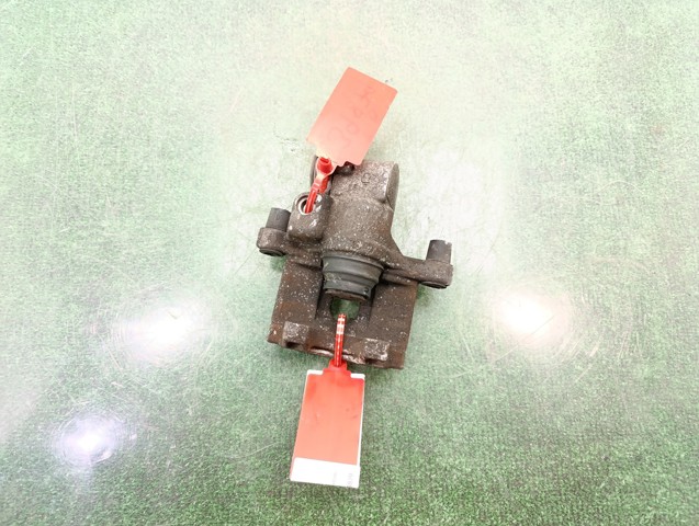 7701049109 RENAULT Pinza de freno trasera derecha  en stock Gandía