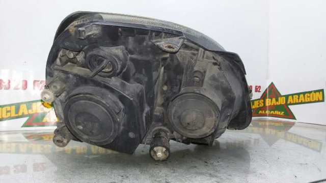 7701054058 Faro izquierdo  en stock Granada