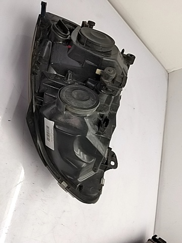 RENAULT 7701054058 Faro izquierdo  en stock Salamanca