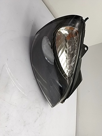 7701054058 RENAULT Faro izquierdo  comprar en Oviedo