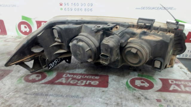 7701054656 Faro izquierdo  en stock Sabadell