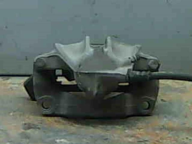7701205833 RENAULT Pinza de freno delantera derecha  en stock Gandía
