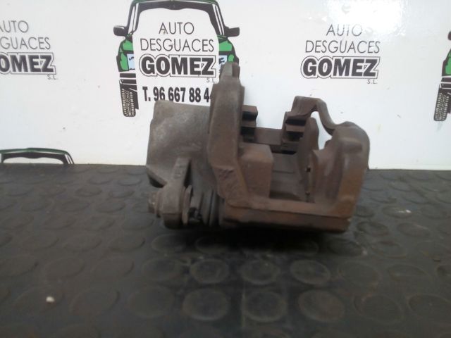 7701207694 Pinza de freno trasera derecha  en stock Granada
