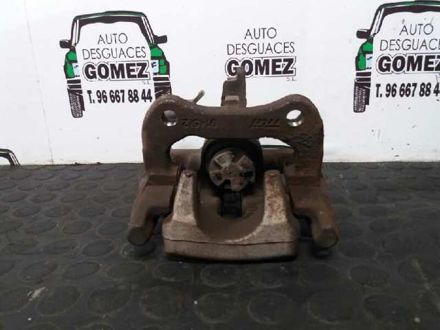 7701207694 Pinza de freno trasera derecha  en stock Castellón